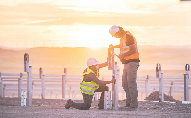 Lightsource bp workers on solar field