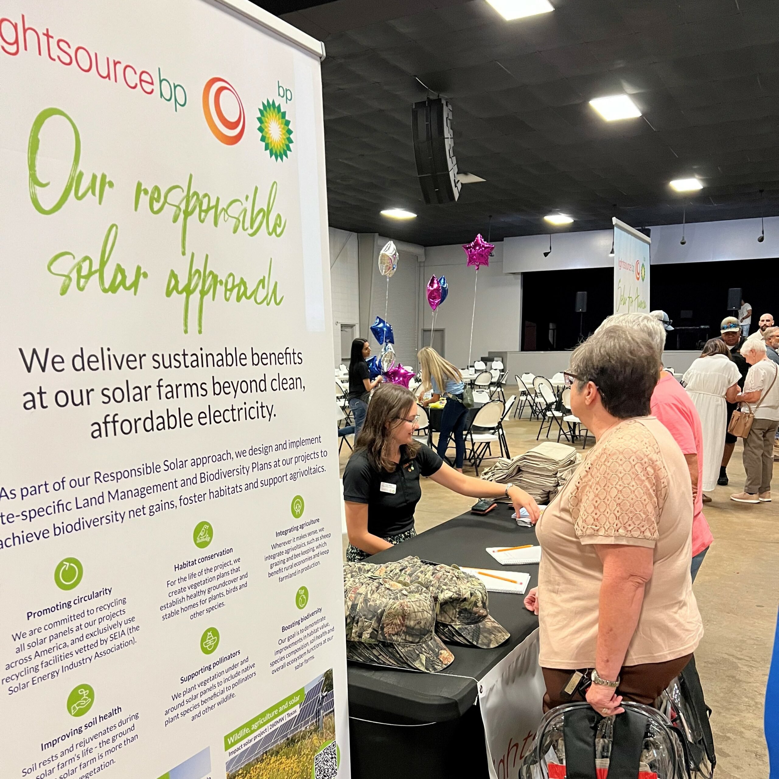 Lightsource bp booth at a Louisiana community event, featuring their 