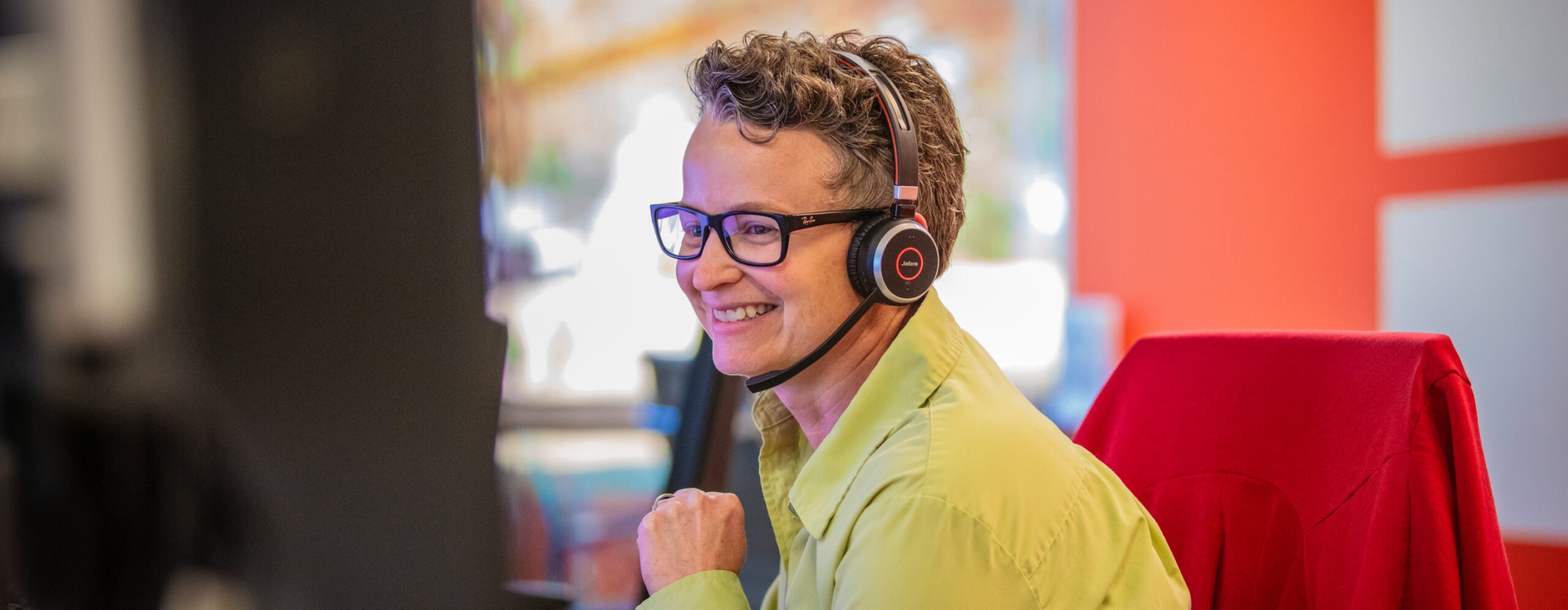 Call center worker with headphones on