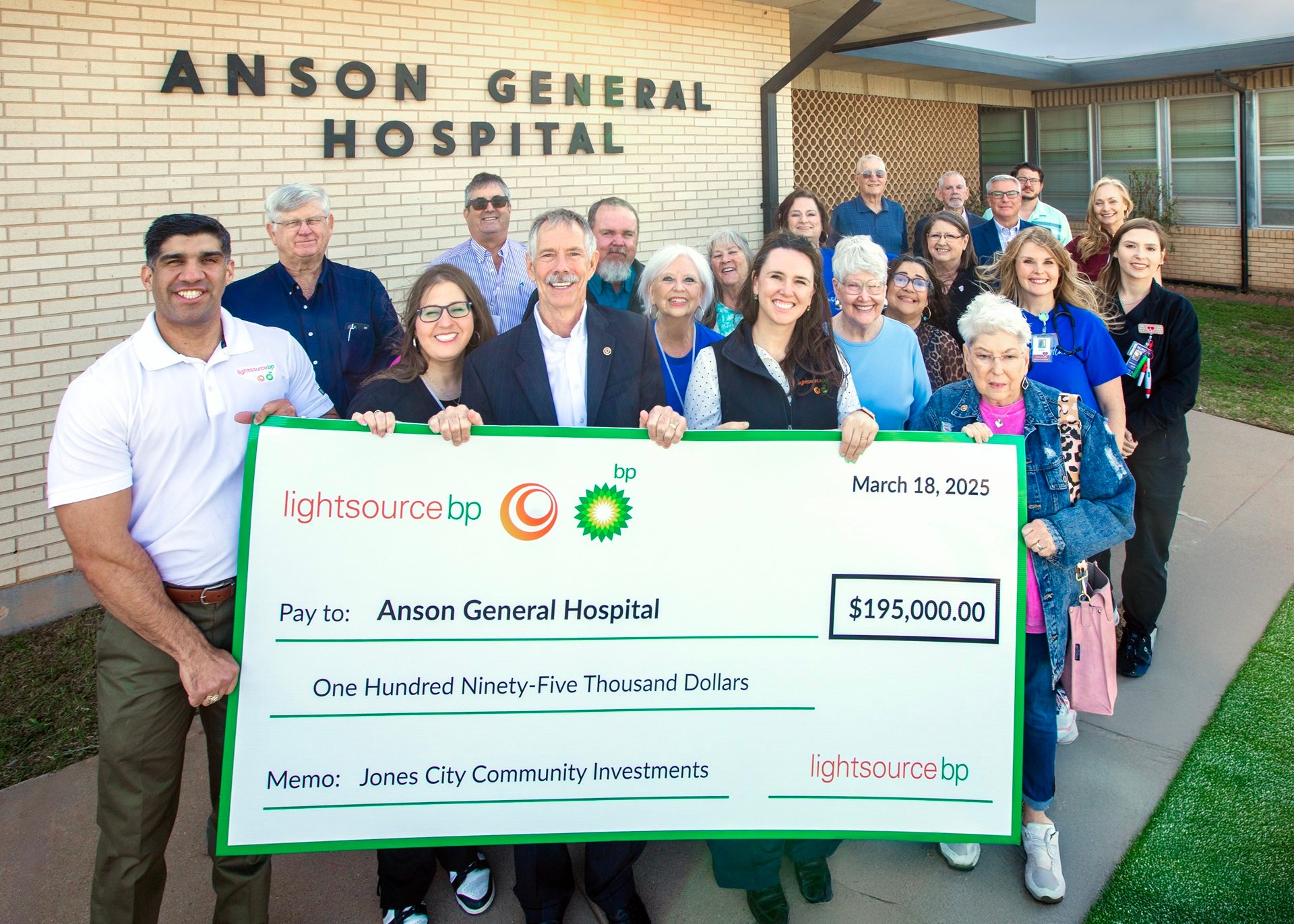Lightsource bp team members present Anson General Hospital with a large donation