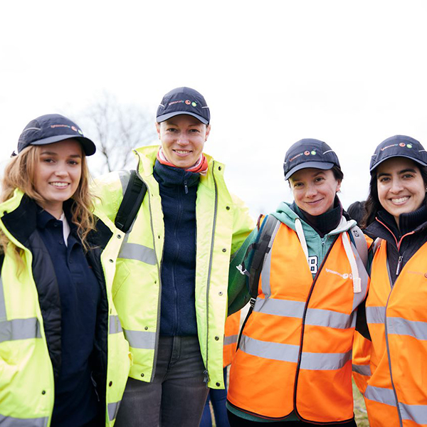 Marina Talalajeva (second left) with 3 team members, in hi vis PPE
